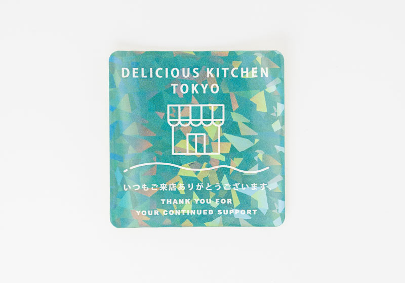 飲食店のロゴとメッセージを入れた角丸四角形のクリスタルシール