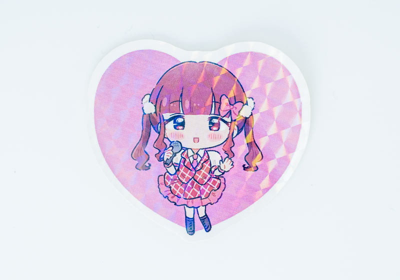 女の子のイラストを印刷したハート形のモザイクシール