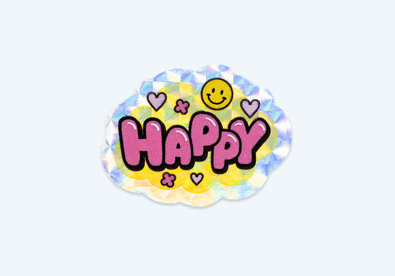 「HAPPY」のロゴの形にカットしたアンダーホロ・モザイクシール